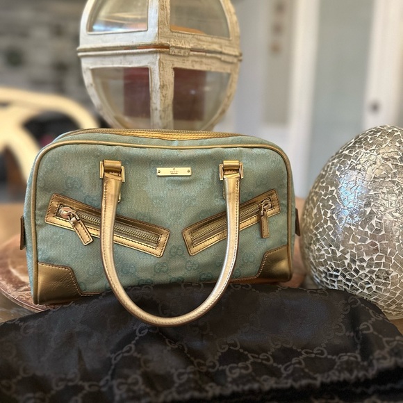 Gucci Handbags - Gucci GG emerald blue and gold handbag